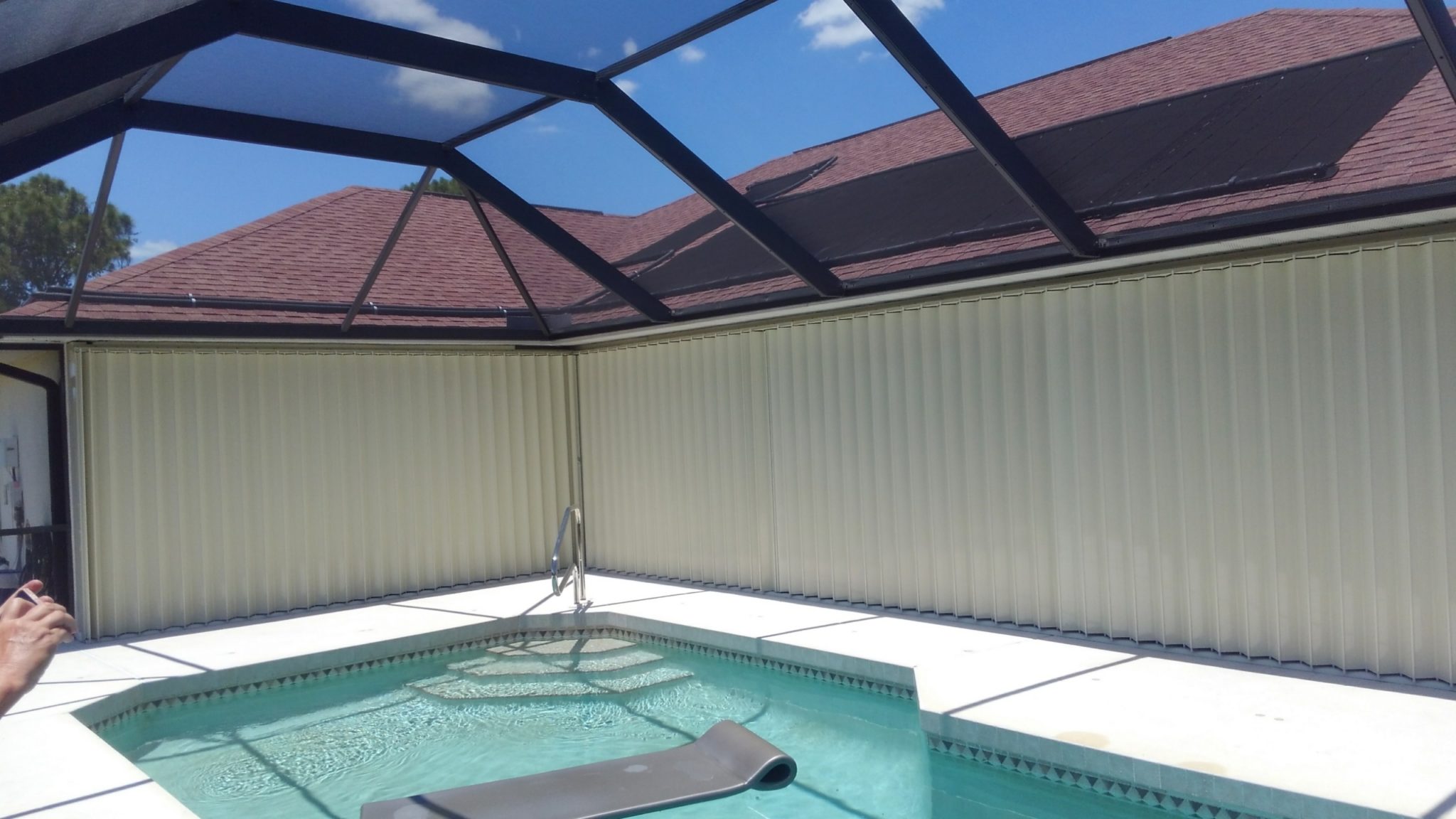 Accordion Shutters - Tropic Storm Protection Inc.